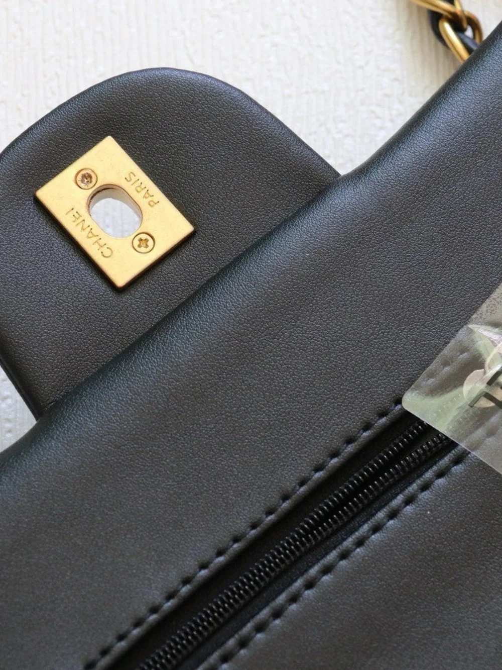 CHANEL Black Quilted Shoulder Bag with Gold Chain